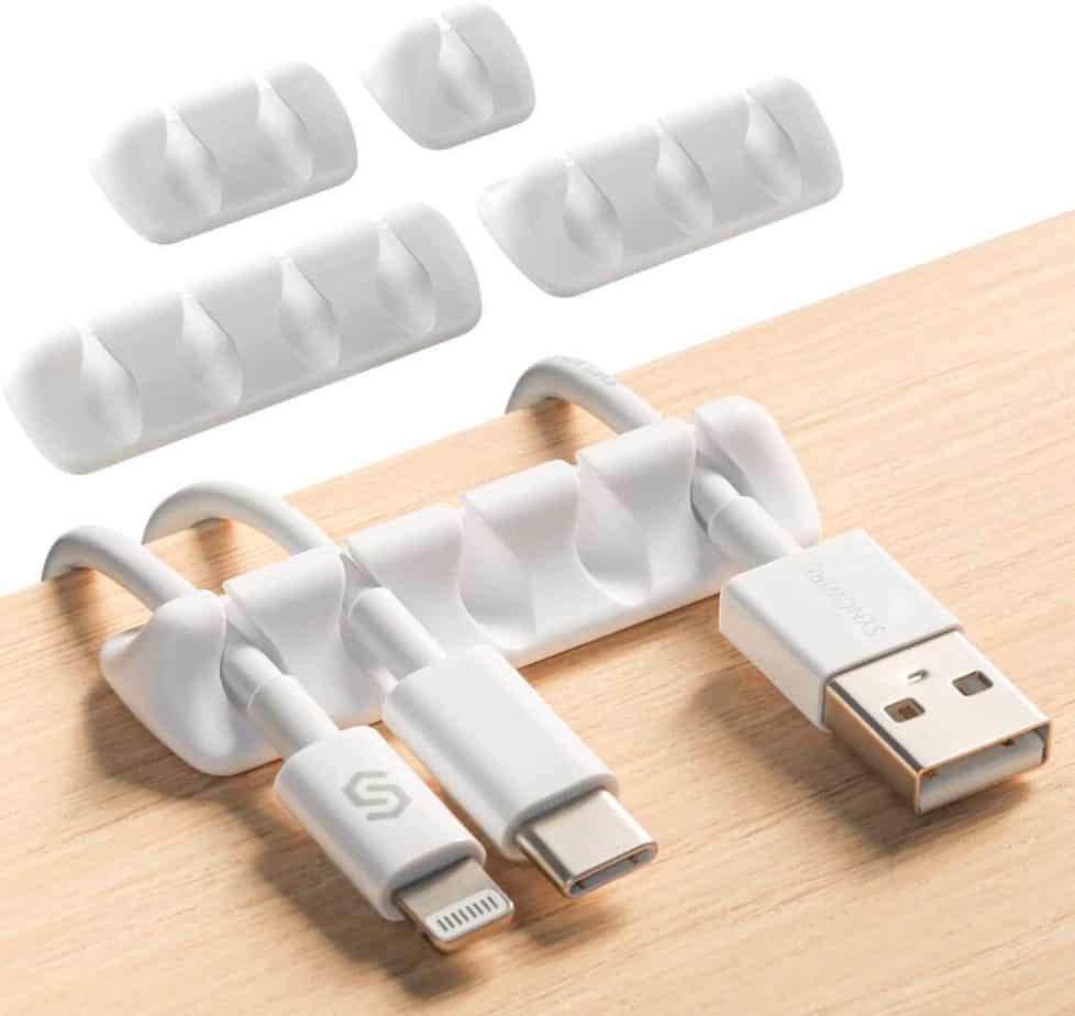 Clip binder clips onto your desk and keep cords in their arms