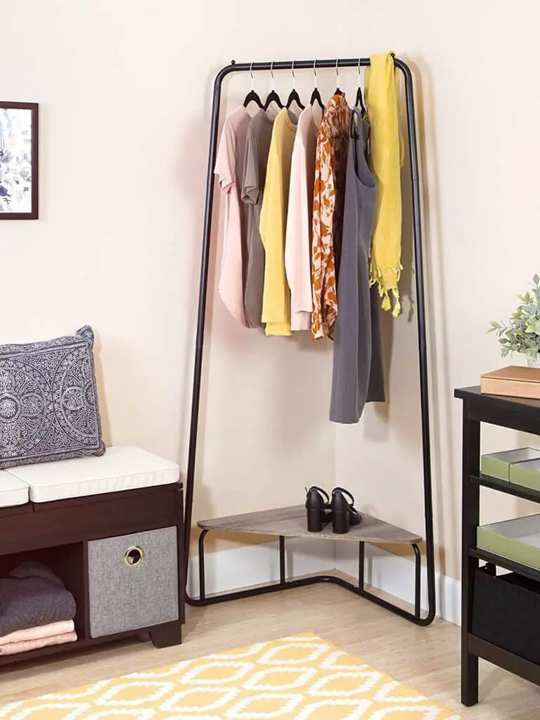 Hang a clothes rack in the corner